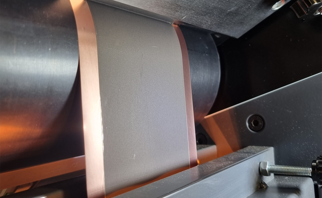 Roll-to-roll production of lithium-ion batteries integrates functional layers like binders and electrolytes, streamlining the manufacturing process